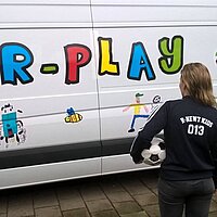 Foto van de bus van R-Play