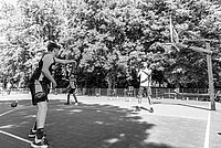 Foto van 3 basketballers