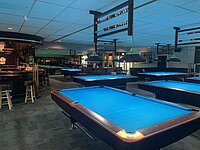 Foto van de poolzaal bij Cues & Darts
